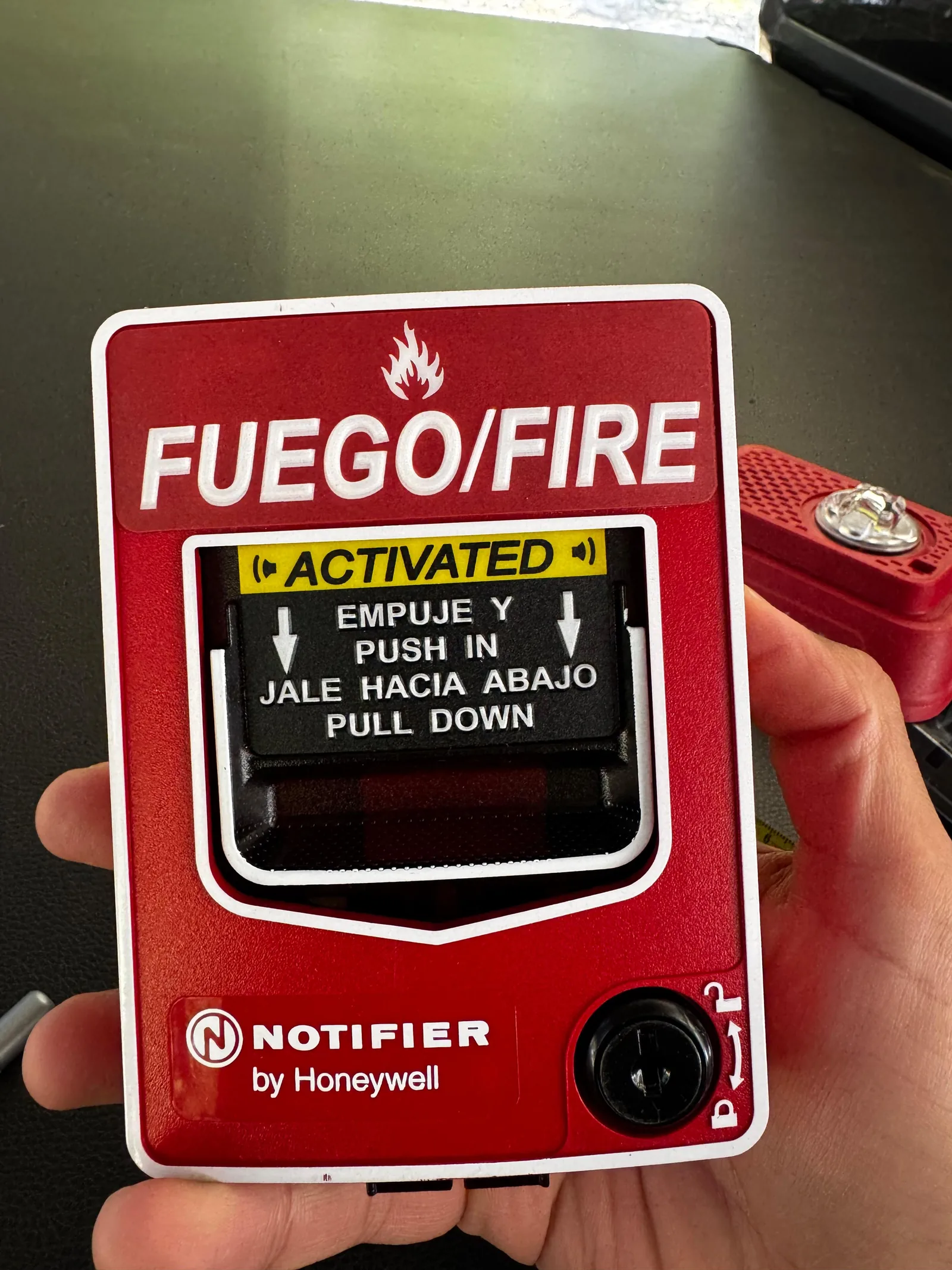 Pulsador manual de alarma, central Honeywell